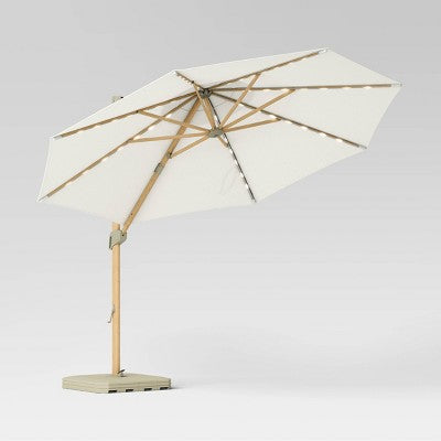  11' Round Offset Solar Outdoor Patio Market Umbrella With Light Wood Pole - Threshold™
