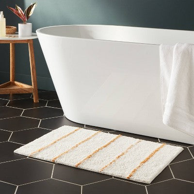  20"x30" Modern Tufted Stripe Bath Rug Yellow/Cream - Threshold™