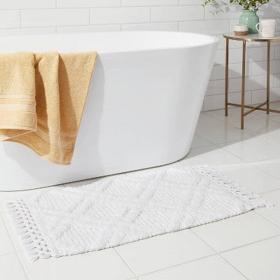  Diamond Embossed Tasseled Woven Bath Rug White - Threshold™