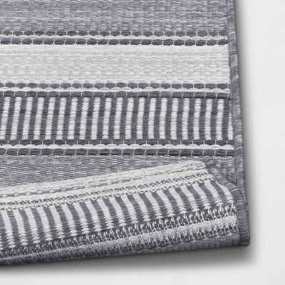 7'x10' Striped Rectangular Woven Outdoor Area Rug Charcoal Gray/Ivory - Threshold™