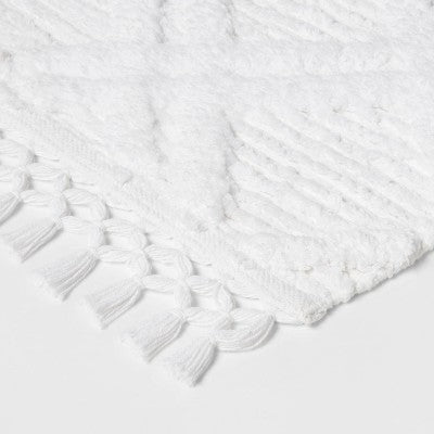 Diamond Embossed Tasseled Woven Bath Rug White - Threshold™