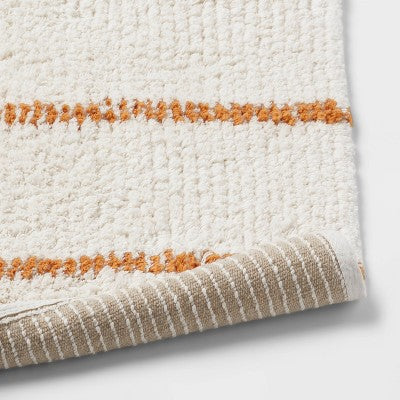  20"x30" Modern Tufted Stripe Bath Rug Yellow/Cream - Threshold™