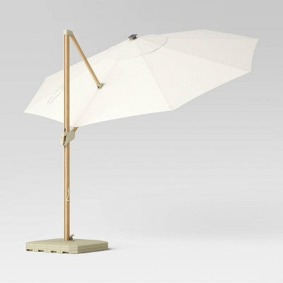  11' Round Offset Solar Outdoor Patio Market Umbrella With Light Wood Pole - Threshold™